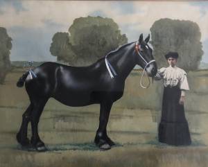 Mary Mason with a black horse
